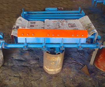 Reversible Scraper
